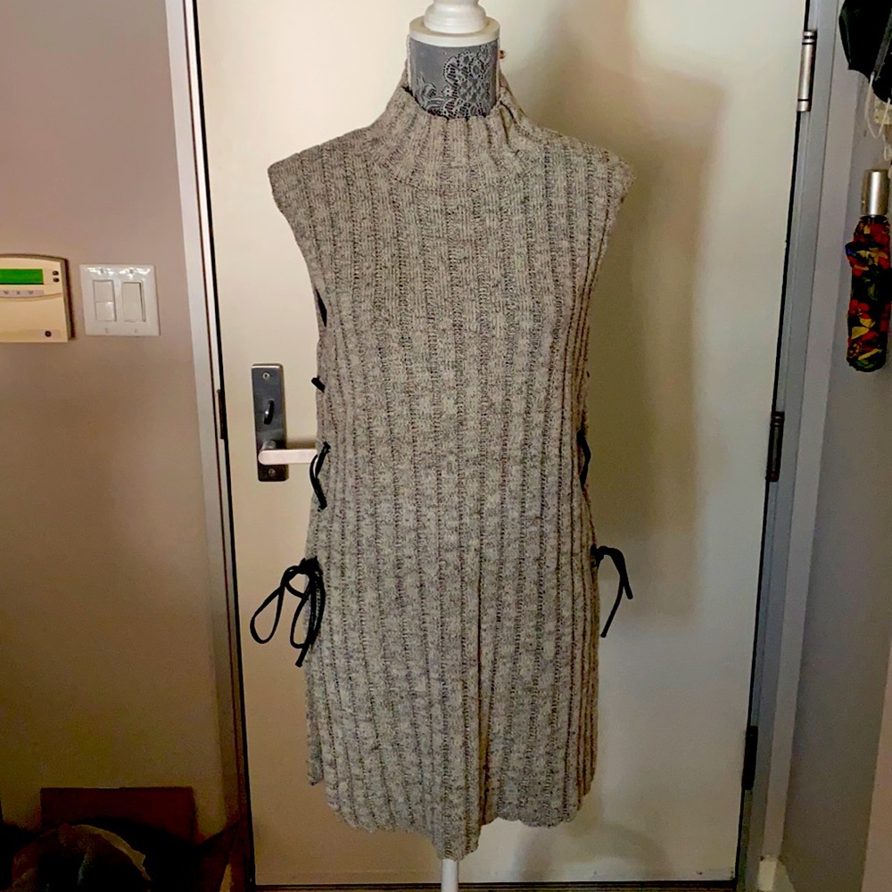 Gray sleeveless sweater dress with side tie detail